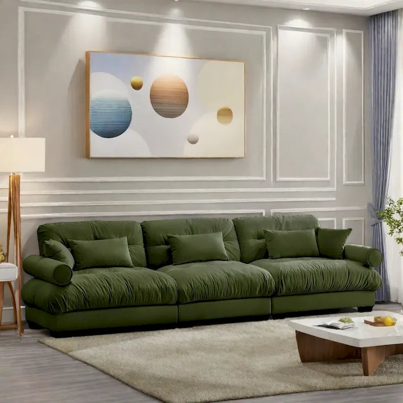 Canapé modulable en velours avec coussin nuage et appuie-têtes cylindriques