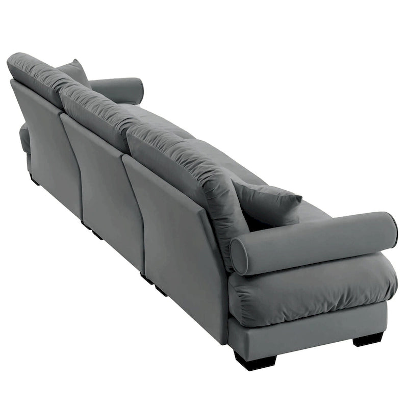 Canapé modulable en velours avec coussin nuage et appuie-têtes cylindriques