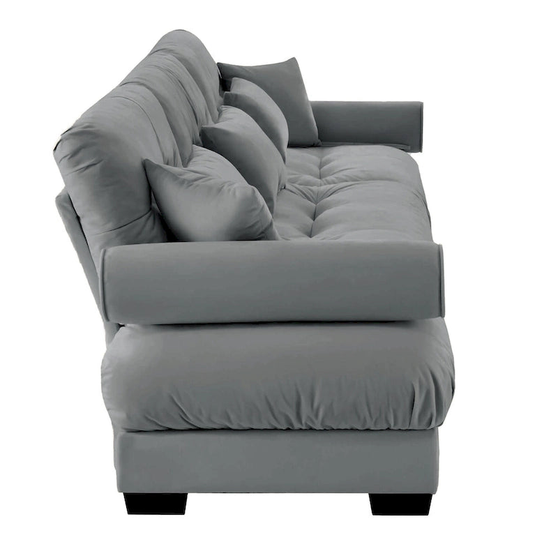 Canapé modulable en velours avec coussin nuage et appuie-têtes cylindriques