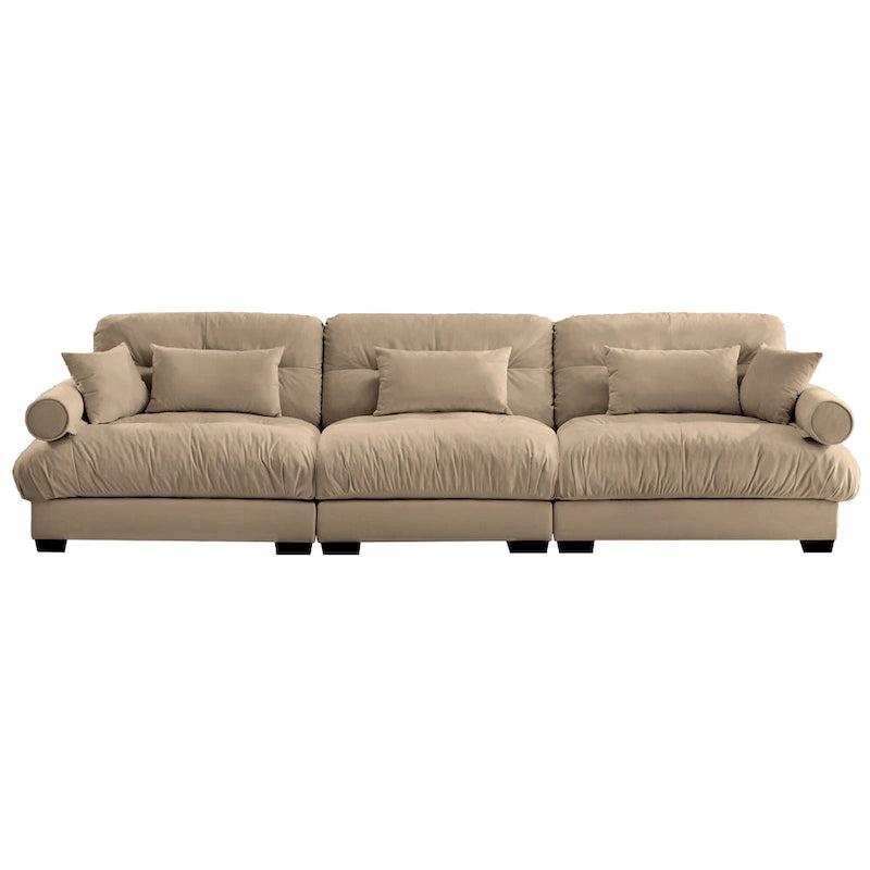 Canapé modulable en velours avec coussin nuage et appuie-têtes cylindriques