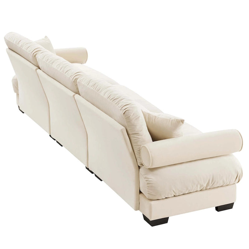 Canapé modulable en velours avec coussin nuage et appuie-têtes cylindriques