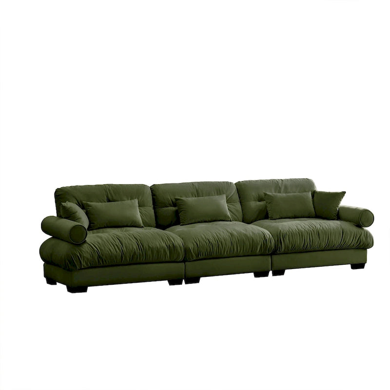 Canapé modulable en velours avec coussin nuage et appuie-têtes cylindriques