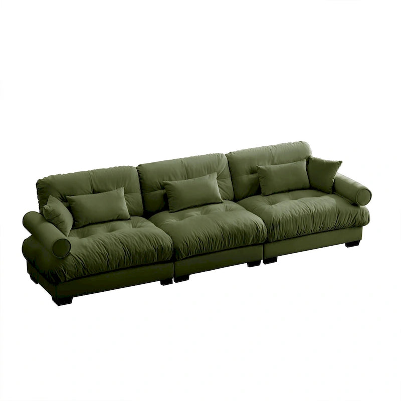 Canapé modulable en velours avec coussin nuage et appuie-têtes cylindriques