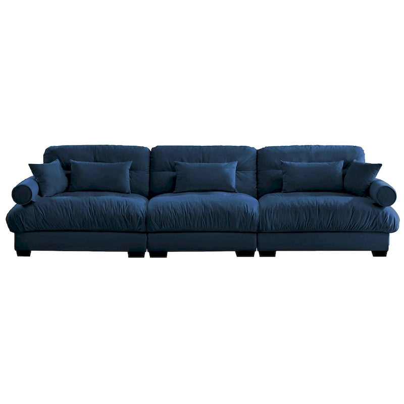 Canapé modulable en velours avec coussin nuage et appuie-têtes cylindriques