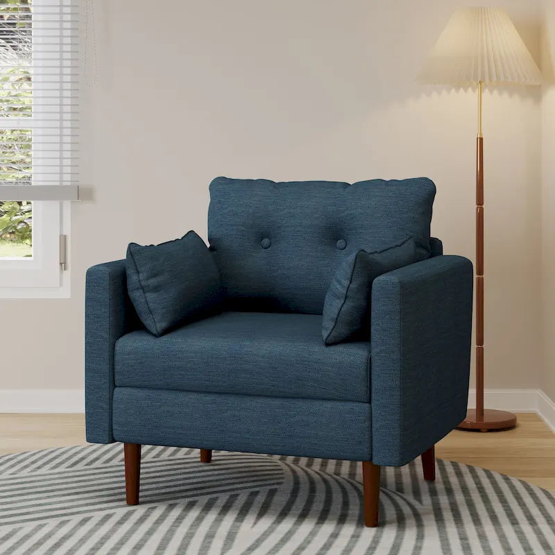 Fauteuil club capitonné avec coussins décoratifs