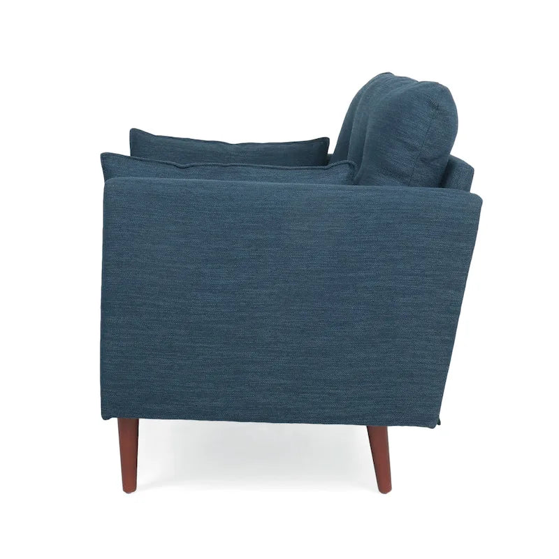 Fauteuil club capitonné avec coussins décoratifs