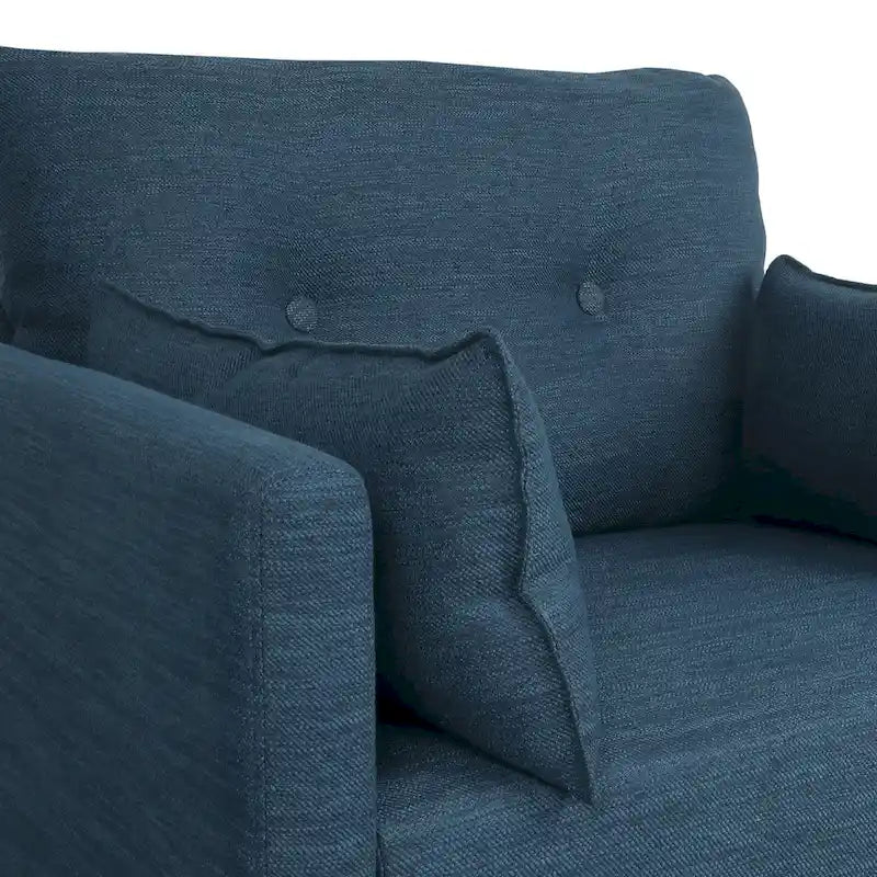 Fauteuil club capitonné avec coussins décoratifs