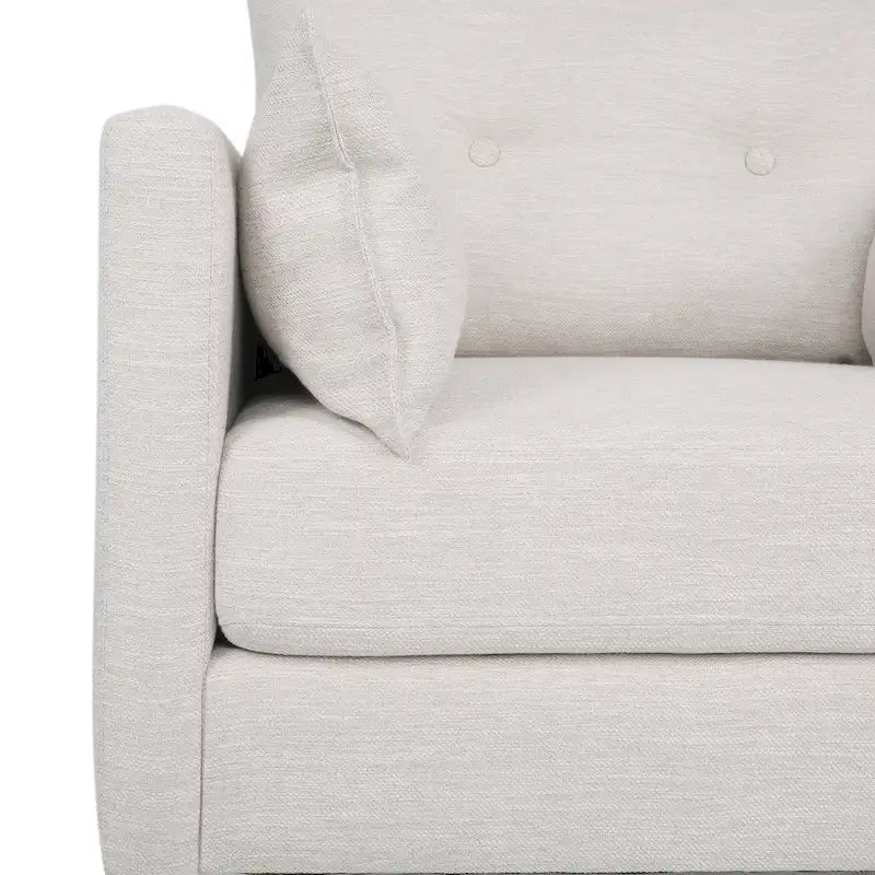 Fauteuil club capitonné avec coussins décoratifs