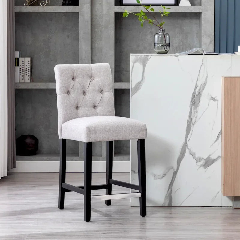 Tabouret de comptoir classique capitonné, pieds noirs