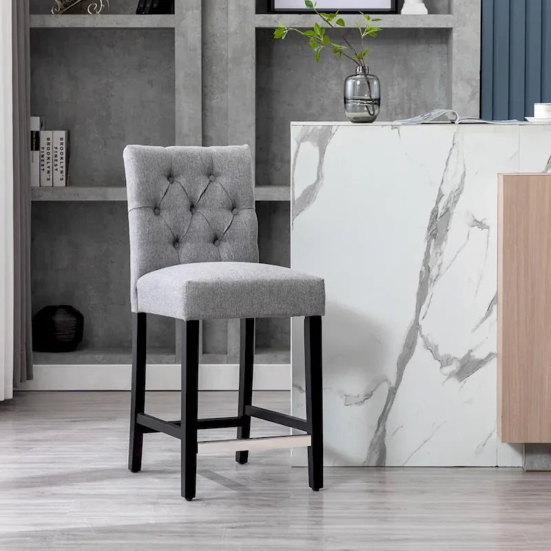 Tabouret de comptoir classique capitonné, pieds noirs