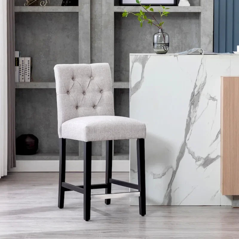 Tabouret de comptoir classique capitonné, pieds noirs